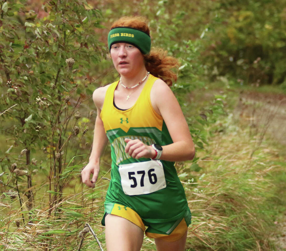 Southwestern senior Emma Wyman runs during her first-place finish at the SCC Meet last month in Piasa. On Saturday, Wyman finished her career by placing 101st in the Class 1A girls cross country state meet Saturday at Detweiller Park in Peoria.