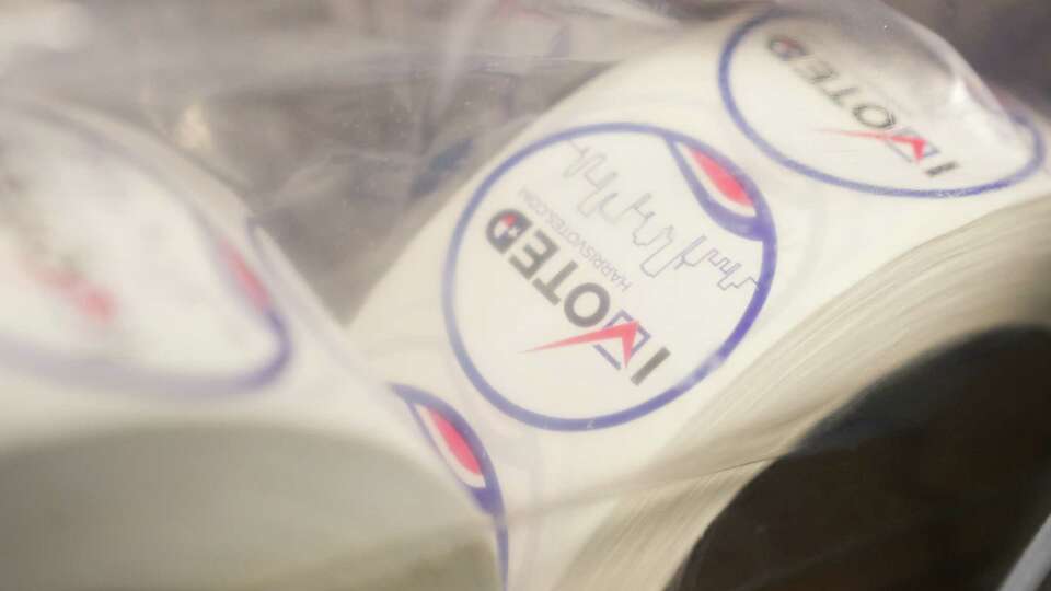 Harris County voting stickers at a polling site on Monday, Nov. 6, 2023 in Houston. Last election, Hill's voting location ran out of paper, she said the events encouraged her to come back with even more fire.