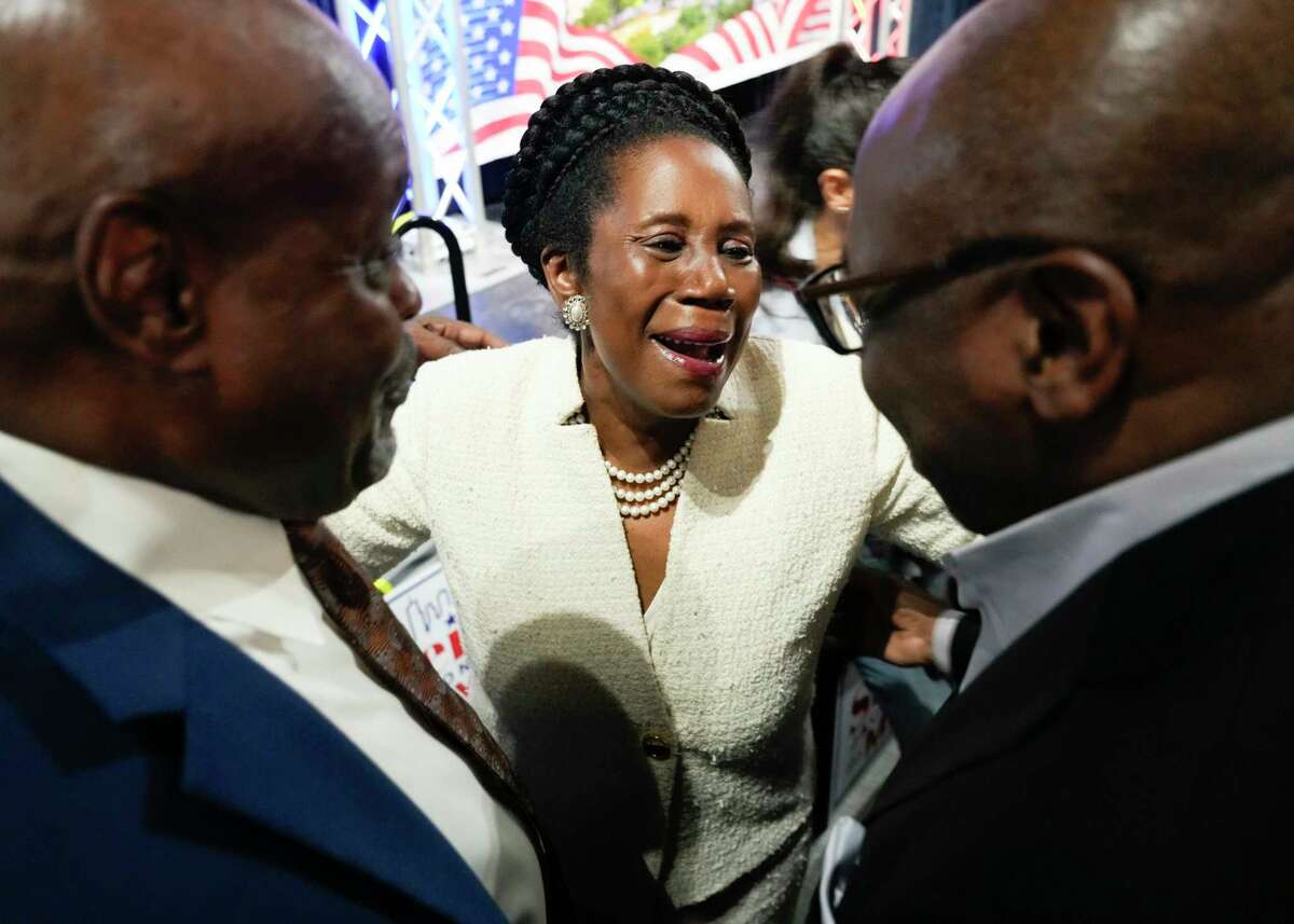 Sheila Jackson Lee visits with supporters before speaking during an election watch party at Bayou Place, Tuesday, Nov. 7, 2023, in Houston.