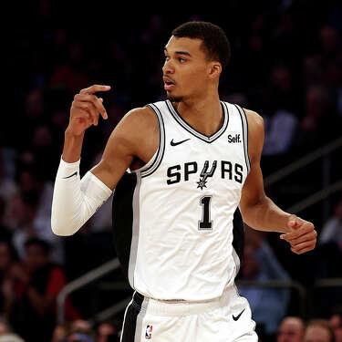 NEW YORK, NEW YORK - NOVEMBER 08: Victor Wembanyama #1 of the San Antonio Spurs reacts against the New York Knicks during the first quarter in the game at Madison Square Garden on November 08, 2023 in New York City. NOTE TO USER: User expressly acknowledges and agrees that, by downloading and or using this photograph, User is consenting to the terms and conditions of the Getty Images License Agreement. (Photo by Elsa/Getty Images)