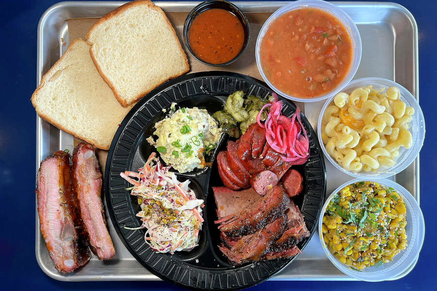 Blu Lacy Smokehouse sells lunch plates with three meats and two sides.