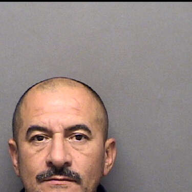 Mark Anthony Ferrel, 47, was booked Thursday and charged with stalking his pregnant ex-girlfriend after she broke up with him in September. 