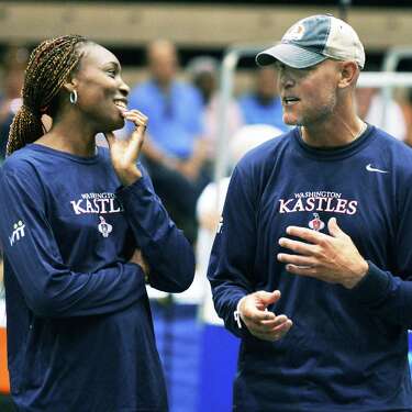 Washington Kastles' Venus Williams, left, and coach Murphy Jensen before the World TeamTennis matches with the New York Sportimes at HVCC Saturday July 21, 2012. (John Carl D'Annibale / Times Union)