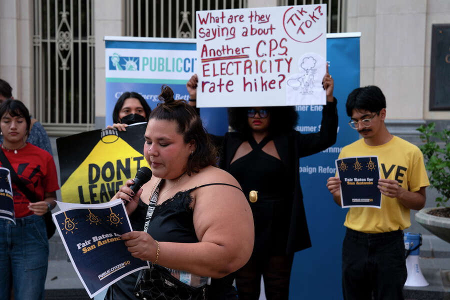 Bonnie Hernandez speaks at a protest against the proposed CPS rate increase.