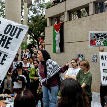 Mariam Aburumuh, a Palestinian student at UTSA, addresses the crowd durinbg a rally in support of a ceasefire in Gaza at UTSA on Thursday, Nov. 9, 2023 in San Antonio, Texas. At noon, students walked out of classes in solidarity with Palestine.