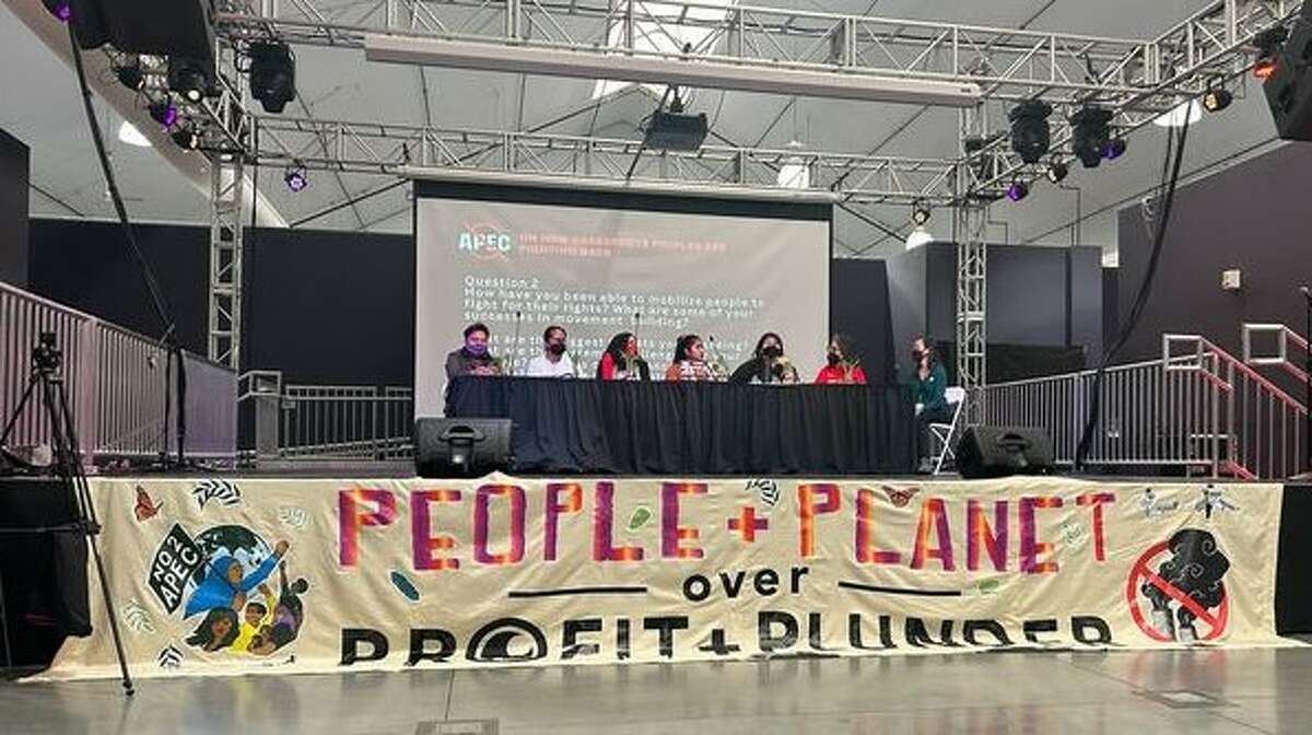 Speakers present an alternative to the Asia-Pacific Economic Cooperation conference during Saturday’s No to APEC summit at San Francisco State University.