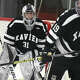 Xavier goalie Ryan Solomon keeps his eyes on the action during a boys ice hockey game against New Canaan at the Darien Ice House on Wednesday, Jan. 29, 2020.
