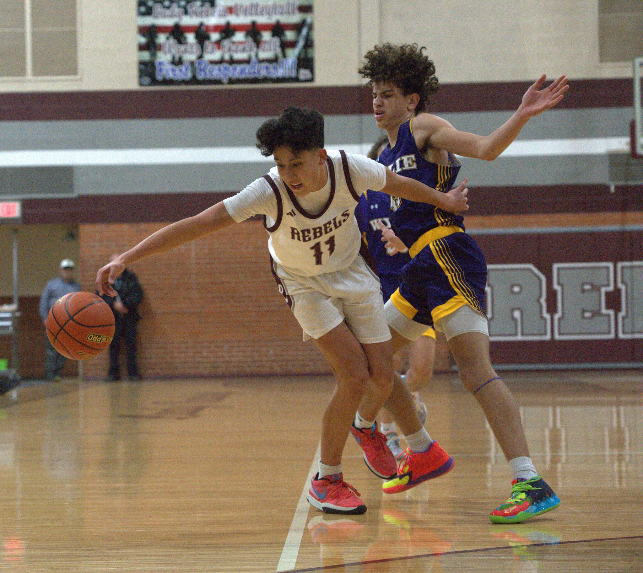 HS BOYS BASKETBALL: Abilene Wylie's hot shooting downs Rebels