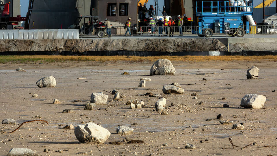 Debris including concrete and rebar from SpaceX's first launch of its Starship is seen in late July. The April launch caused major damage to the Boca Chica launch site and led the FAA to yank the company's approval to launch.