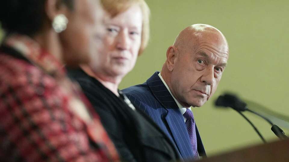 Texas Sen. John Whitmire listens to U.S. Rep. Sheila Jackson Lee during a mayoral forum hosted by Transportation Advocacy Group Houston Chapter on Wednesday, Nov. 15, 2023 in Houston.