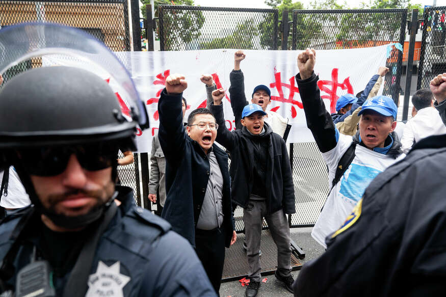 Protesters rally scuffle with police at Fifth and Mission Street during a demonstration against the 2023 Asia-Pacific Economic Coroperation (APEC) Economic Leaders' WEek and CEO Summit in San Francsico. Wednesday, Nov 15, 2023