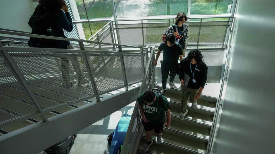 Israel Garcia, 17, and his classmates look for a classroom to study for an upcoming exam at Carnegie Vanguard High School on Thursday, Nov. 9, 2023, in Houston.