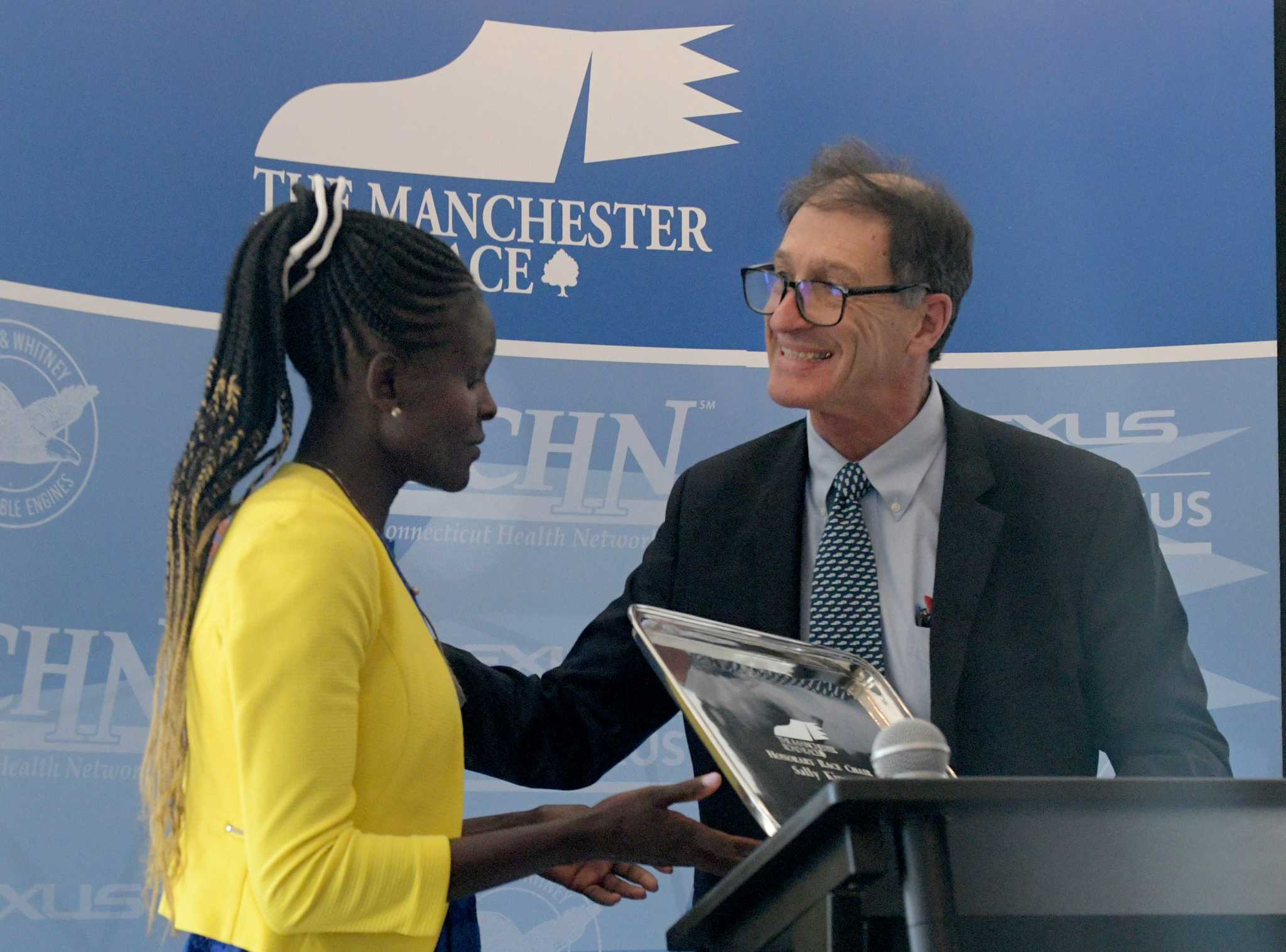 Runner from Kenya enjoys her return to Manchester for annual road race