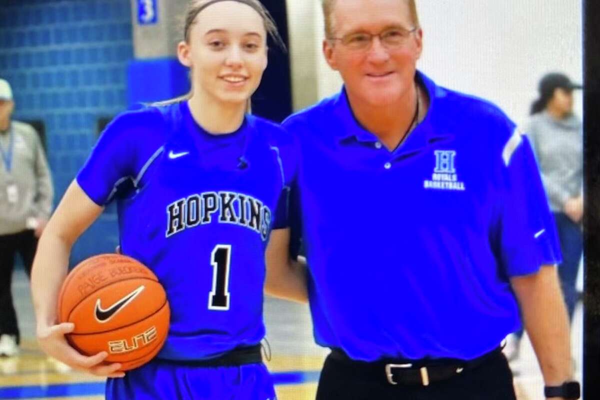 Brian Cosgriff with Paige Bueckers. Bueckers played for Cosgriff at Hopkins High School and led the school to the 2019 state championship and back-to-back undefeated seasons.