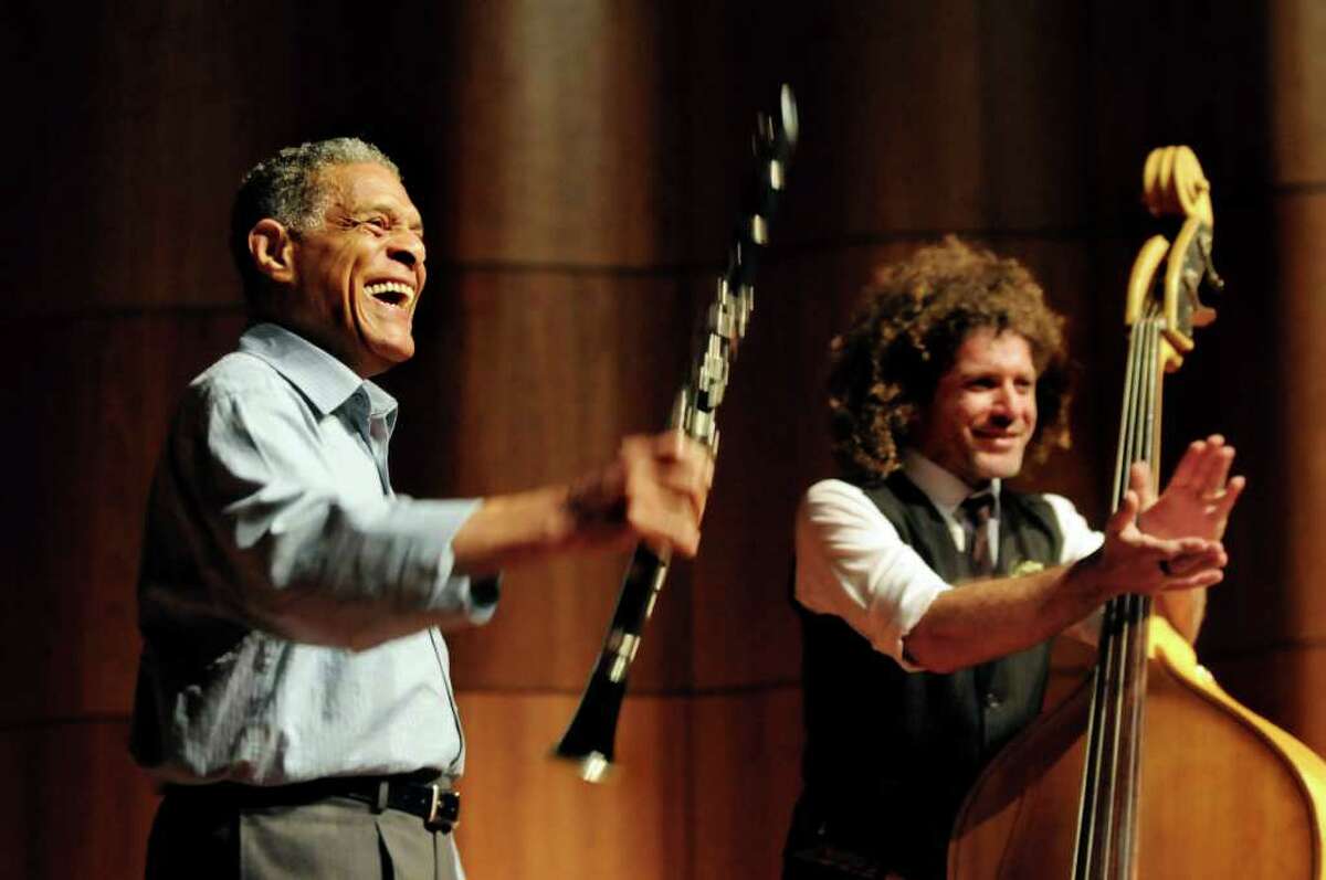 Charlie Gabriel, left, and Ben Jaffe, members of the Preservation Hall Jazz Band, perform and talk about the history of jazz with about 400 students from two area elementary schools on Tuesday, Oct. 26, 2010, at The College of Saint Rose in Albany, N.Y. (Cindy Schultz / Times Union)