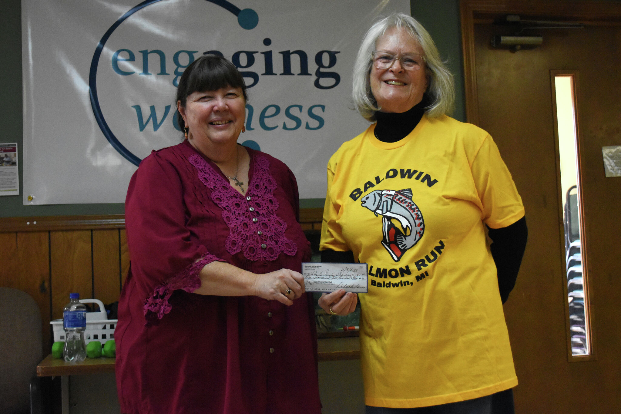 Baldwin Salmon Run donates to St. Ann’s Lake County Senior Center