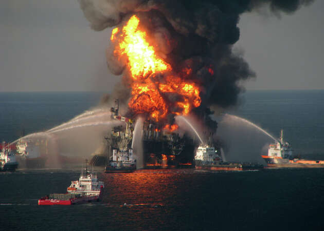 U.S. Coast Guard, fire boat response crews battle the blazing remnants of the off shore oil rig Deepwater Horizon in the Gulf of Mexico on April 21, 2010 near New Orleans, Louisiana. 