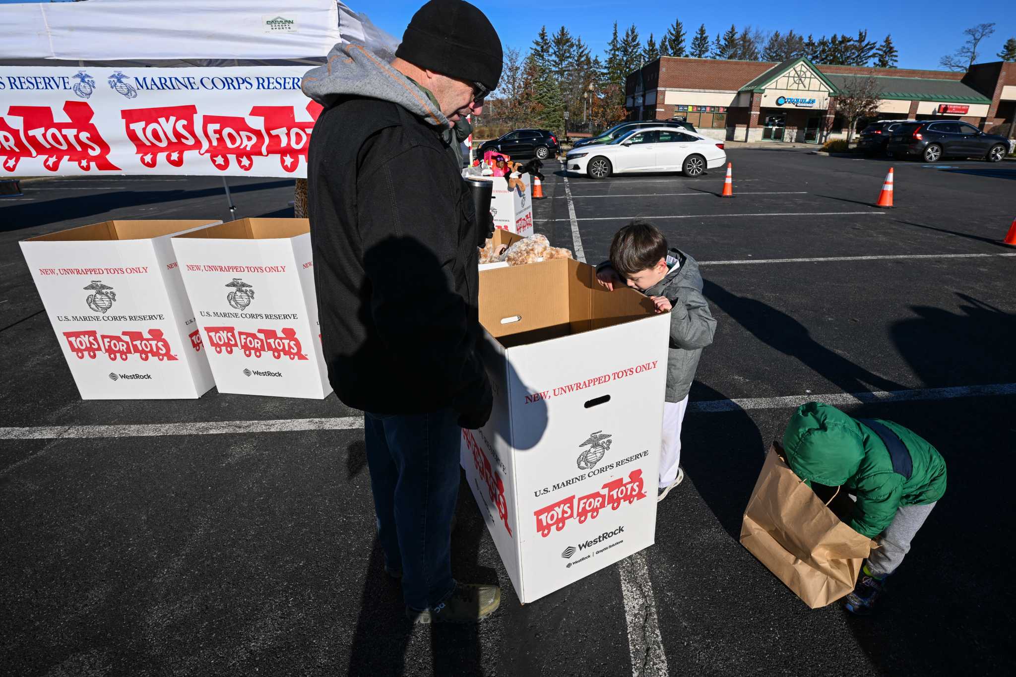 Holiday helpers stuff Niskayuna fire truck full of goods