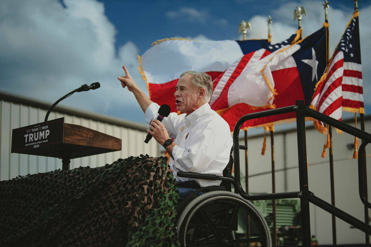 Texas Gov. Greg Abbott gives a speech endorsing former President Donald Trump in the Republican presidential primary, during an appearance near the southern border at the South Texas International Airport at Edinburg on Sunday, Nov. 19, 2023. (Meridith Kohut/The New York Times)