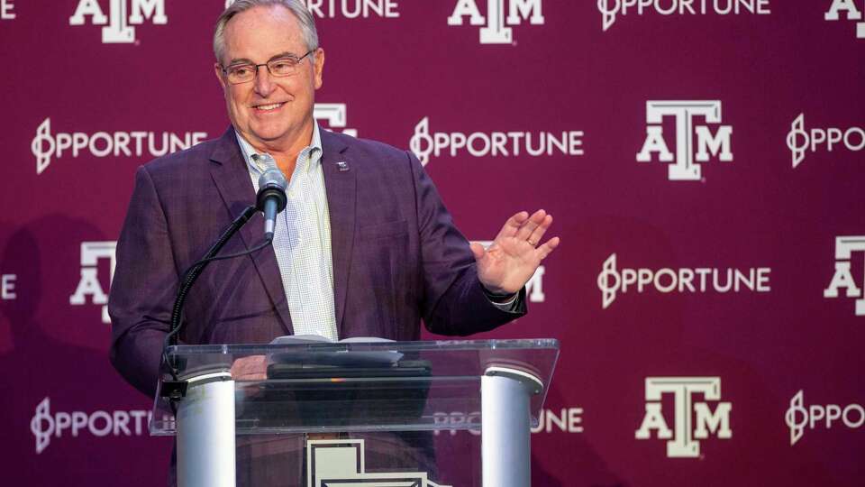 Texas A&M president Mark Welsh III speaks at awelcome celebration for new head coach Mike Elko on Monday, Nov. 27, 2023, in College Station, Texas. (Meredith Seaver/College Station Eagle via AP)