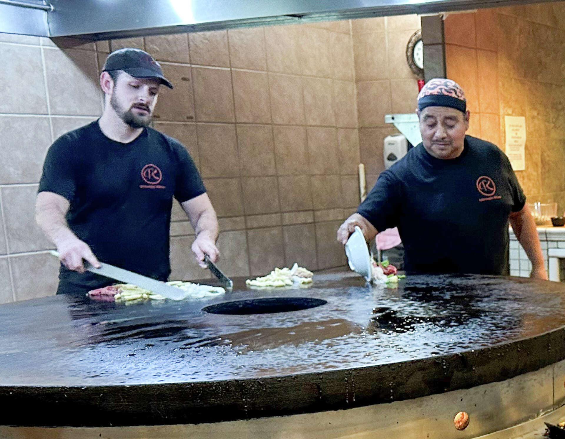 Ghengis Khan Mongolian BBQ provides guests with dinner and a show