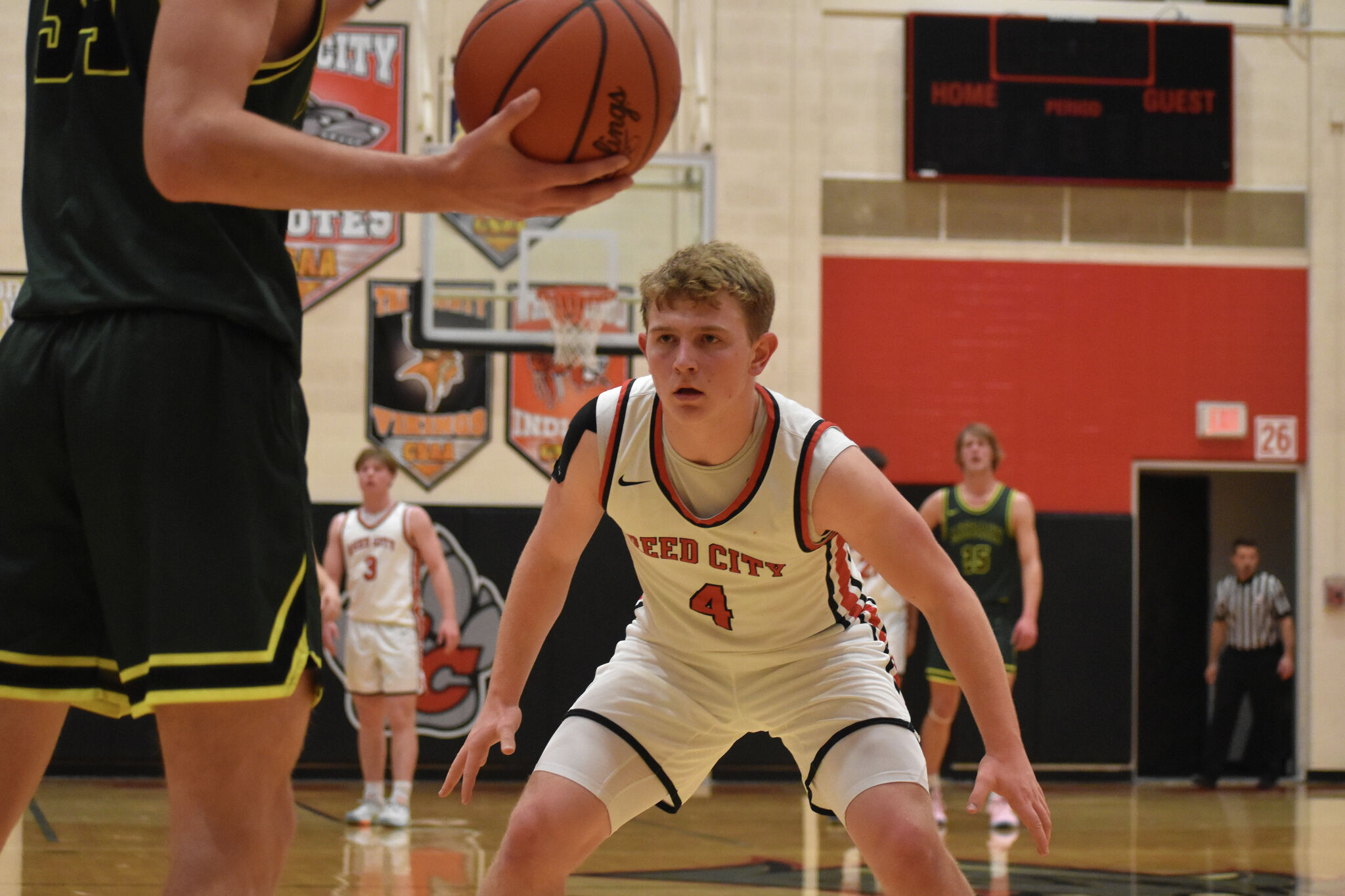 Reed City basketball drops season opener to McBain