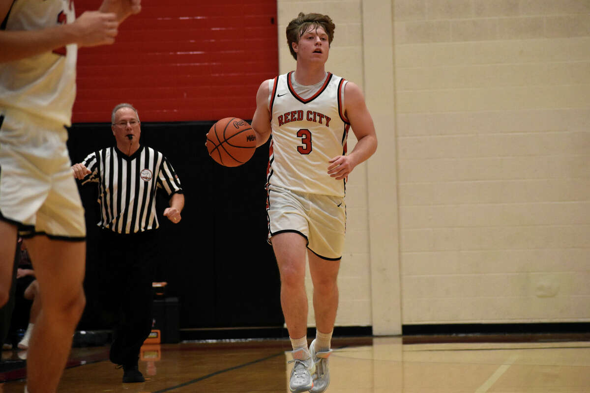 Reed City basketball drops season opener to McBain