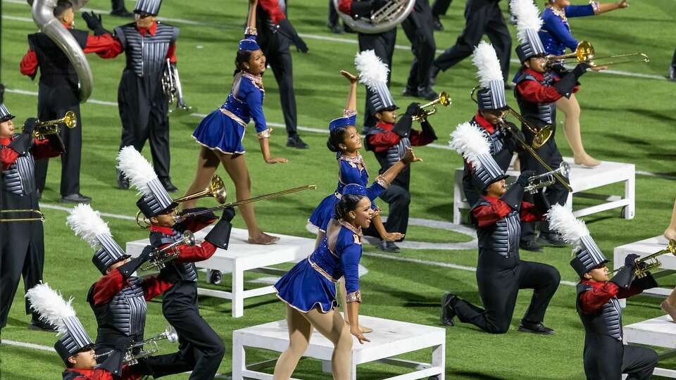 Fort Bend ISD's Austin High School marching band and dance team perform together in 2022. 