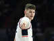 Article Image UConn center Donovan Clingan (32) plays in UConn's 84-64 win over University of New Hampshire in the NCAA men's basketball game at Gampel Pavilion in Storrs, Conn. Monday, Nov. 27, 2023.
