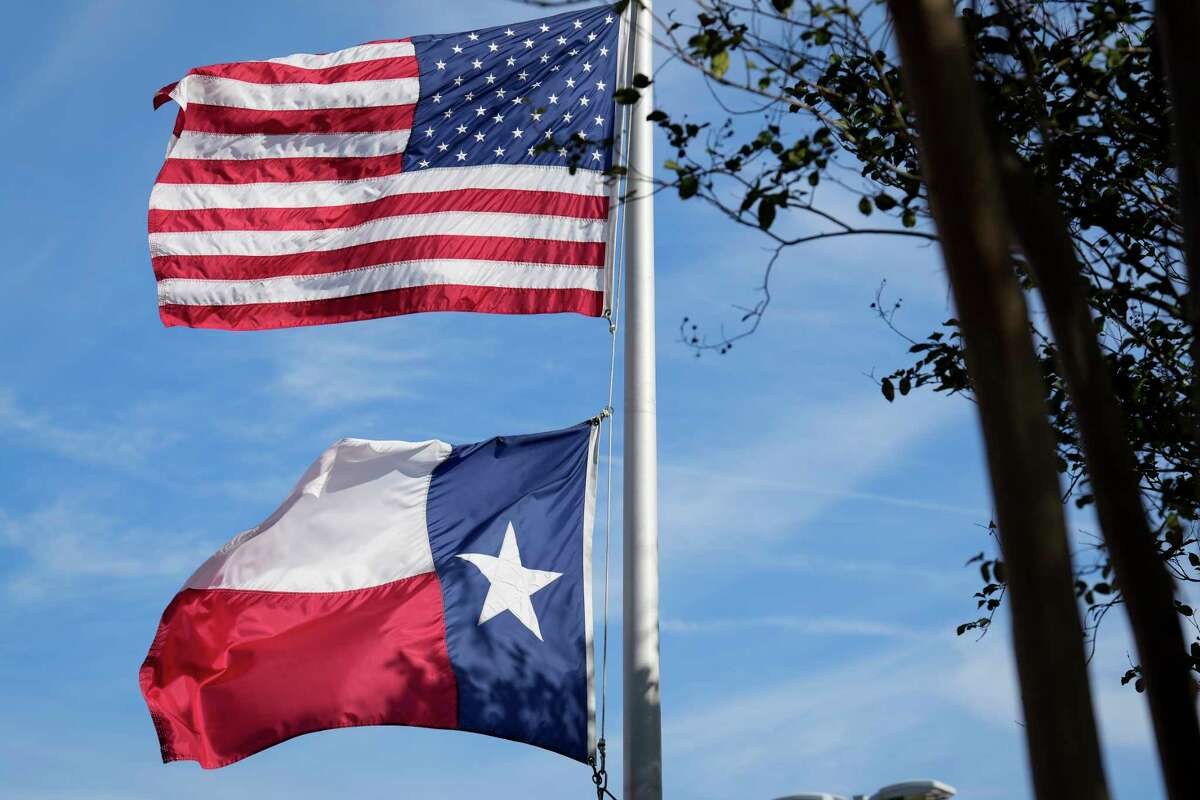 An American flag and a Texas state flag are photographed on Monday, Nov. 27, 2023 at Gregg Elementary School in Houston.