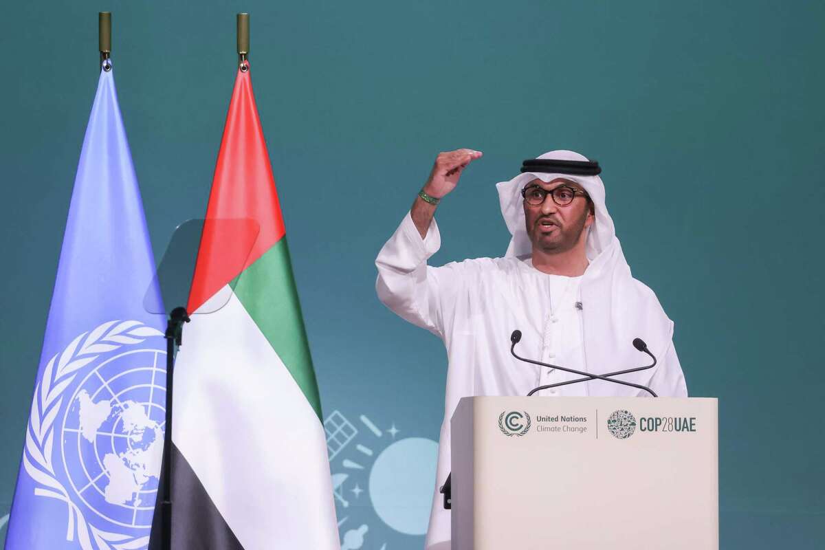 Sultan Ahmed Al Jaber, chief executive officer of Abu Dhabi National Oil Co. (ADNOC) and president of COP28, speaks on the opening day of the COP28 climate conference at Expo City in Dubai, United Arab Emirates, on Thursday, Nov. 30, 2023. More than 70,000 politicians, diplomats, campaigners, financiers and business leaders will fly to Dubai to talk about arresting the world's slide toward environmental catastrophe. Photographer: Hollie Adams/Bloomberg