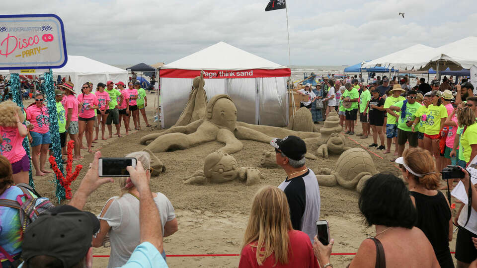 Contestants work to build their sandcastle in the 33rd Annual AIA Houston Sandcastle competition Saturday, Aug. 24, 2019, in Galveston, Texas. The competition is returning next year after negotiations. 