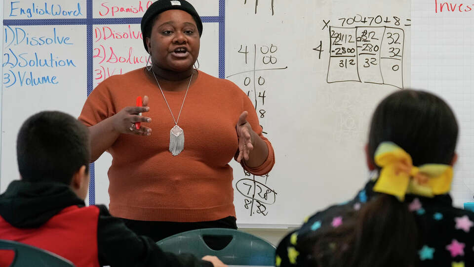 A dual language program teacher is teaching fourth grade science on Monday, Nov. 27, 2023 at Gregg Elementary School in Houston.