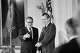 Henry Kissinger and President Richard Nixon answer questions in the East Room of the White Houtilize after Kissinger was sworn in as secretary of state on Sept. 22, 1973.
