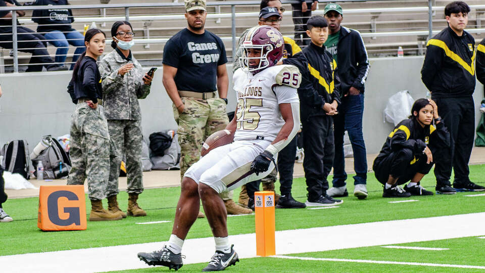 Summer Creek's Lloyd Avant (25) reacts as he crosses the goal line for a touchdown against Hightower in the first half of a high school football quarterfinal playoff football game at Cy-Fair FCU Stadium, Saturday, Dec. 2, 2023 Houston.