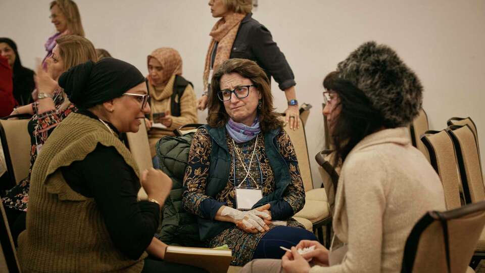 Muslim and Jewish women chat as they gather during an interfaith workshop on the Israeli-Palestinian conflict at Rutgers University on Sunday, Nov. 19, 2023, in New Brunswick, N.J. The latest violence, triggered by the Oct. 7 Hamas attack on Israel, is prompting some to question such dialogue, its role, impact -- or how to even have it-- while steeling the resolve of others to connect and wrestle together with the challenges.