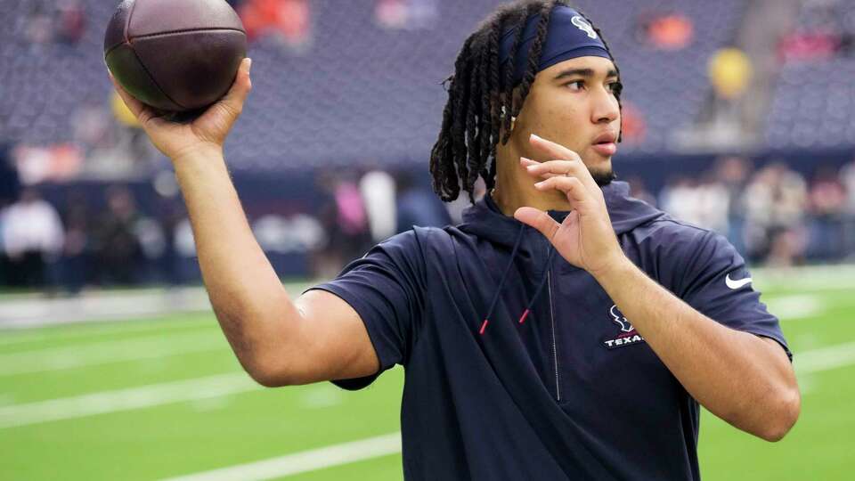 Houston Texans quarterback C.J. Stroud warms up before an NFL football game against the Denver Broncos Sunday, Dec. 3, 2023, in Houston.