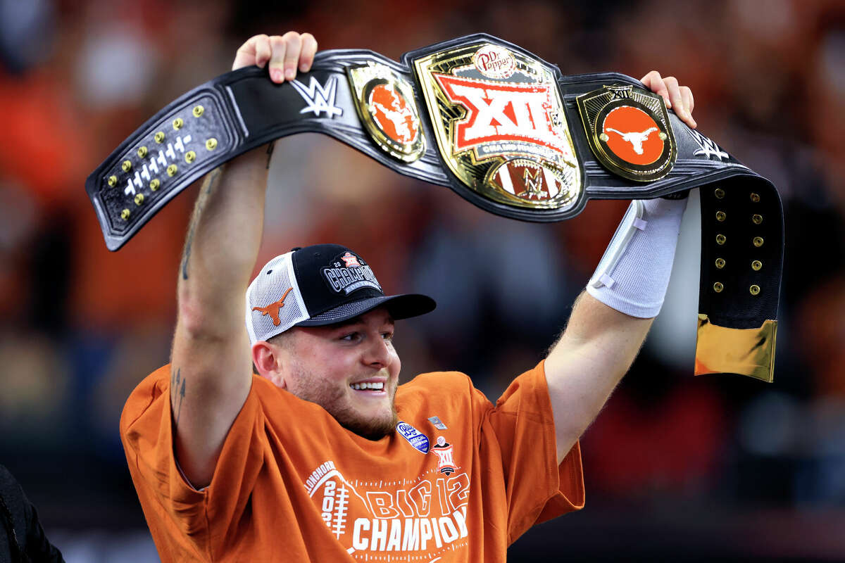 Quarterback Quinn Ewers #3 of the Texas Longhorns celebrates after Texas defeated the Oklahoma State Cowboys in the Big 12 Championship at AT&T Stadium on December 2, 2023 in Arlington, Texas.