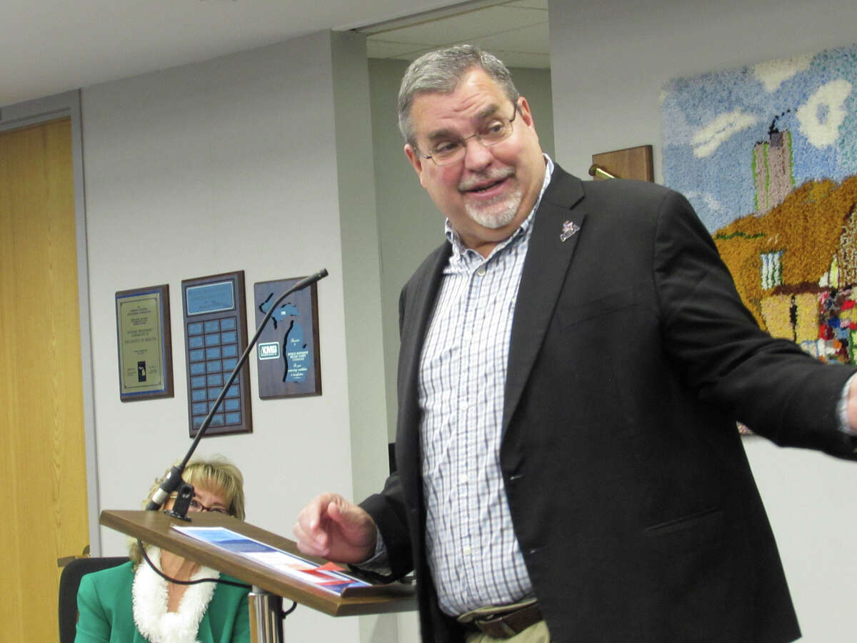 Tony Stamas, president/CEO of the Midland Business Alliance, introduces the Advisory Committee on Infrastructure before they provide an update on flood reduction projects to the Midland County Board of Commissioners on Dec. 5, 2023 in the County Services Building.