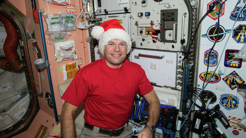 European Space Agency astronaut Andreas Mogensen poses wearing a Santa Claus hat while on the International Space Station on Nov. 9, 2023.