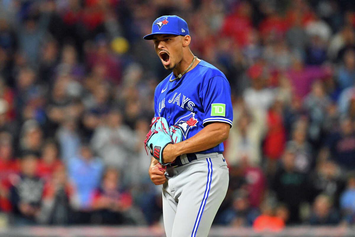 Closer Jordan Hicks #12 of the Toronto Blue Jays reacts after getting the final out against the Cleveland Guardians at Progressive Field on August 07, 2023 in Cleveland, Ohio. The Blue Jays defeated the Guardians 3-1. 