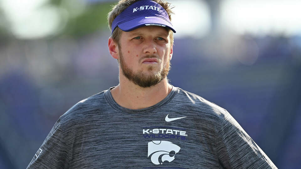 MANHATTAN, KANSAS - SEPTEMBER 11: Quarterbacks coach Collin Klein of the Kansas State Wildcats looks on prior to a game against the Southern Illinois Salukis at Bill Snyder Family Football Stadium on September 11, 2021 in Manhattan, Kansas. (Photo by Peter G. Aiken/Getty Images)