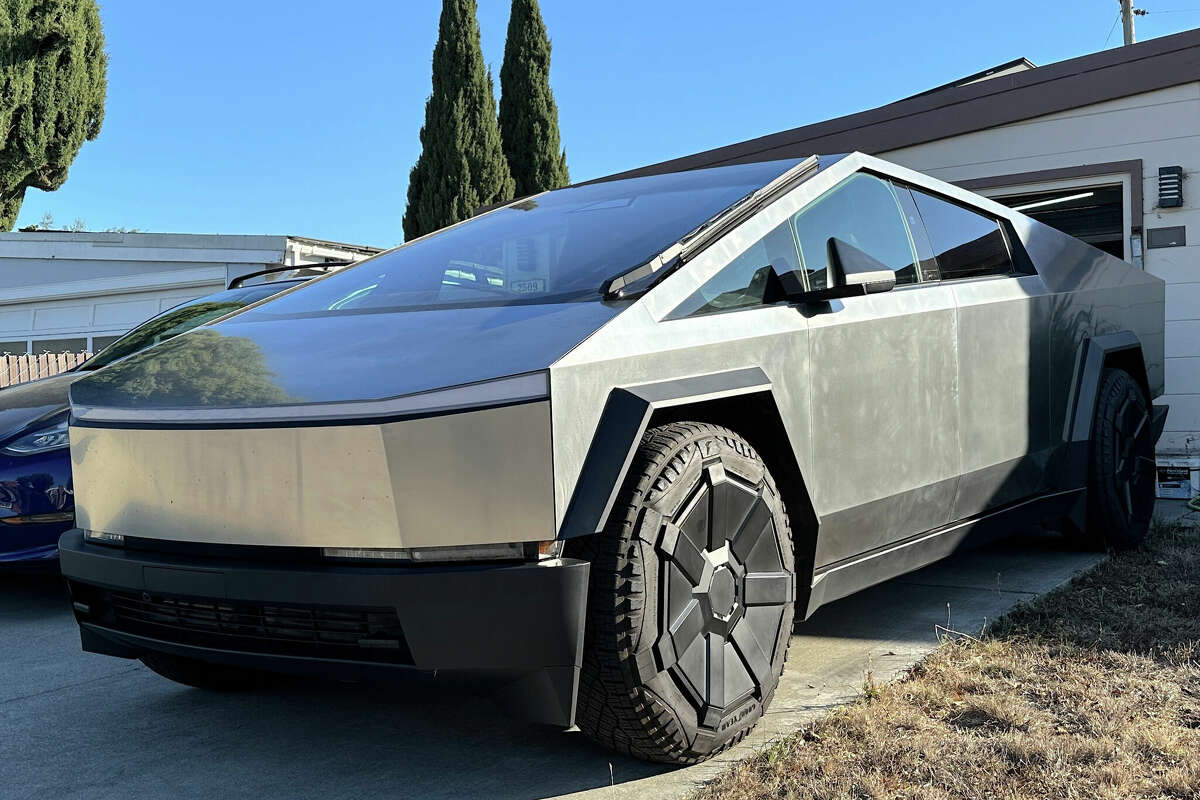 A vehicle from Tesla's electric pickup 'Cybertruck' series parked in front of a garage in Silicon Valley in early November.  