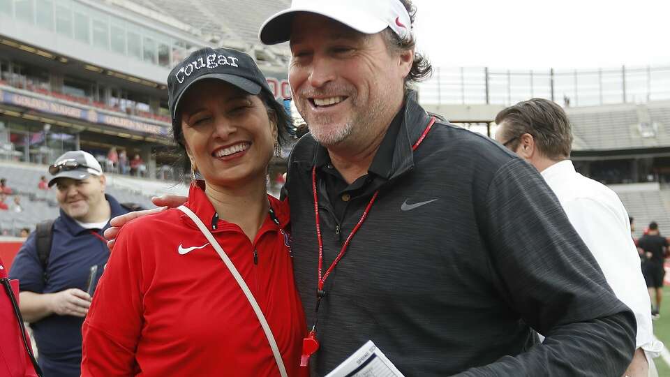 A 'Friday Night Lights' spring practice in April 2019 was among happier times for UH president Renu Khator, left, and football coach Dana Holgorsen. 