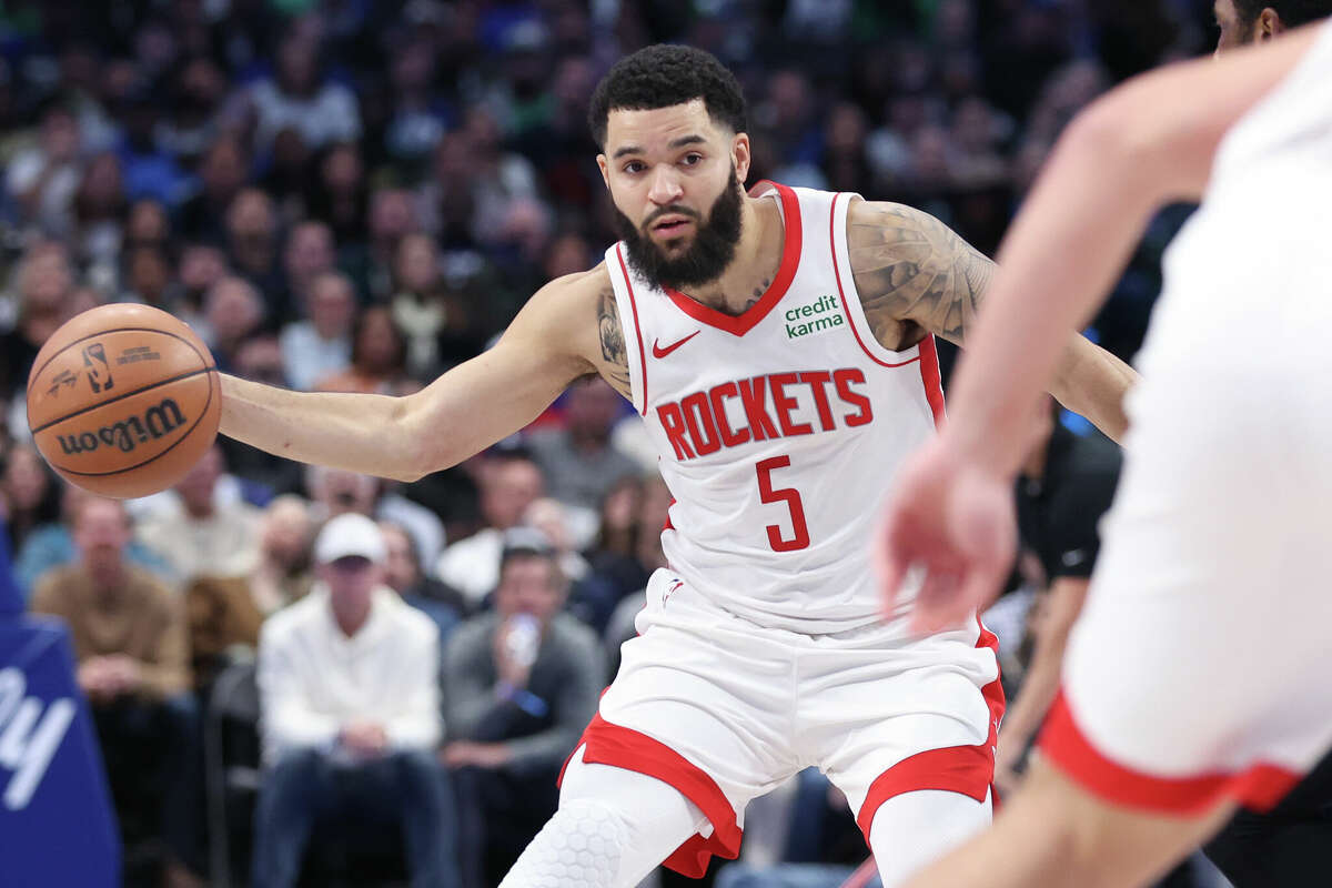 Fred VanVleet #5 of the Houston Rockets passes the ball against the Dallas Mavericks in the second half during an NBA In-Season Tournament game at American Airlines Center on November 28, 2023 in Dallas, Texas. 