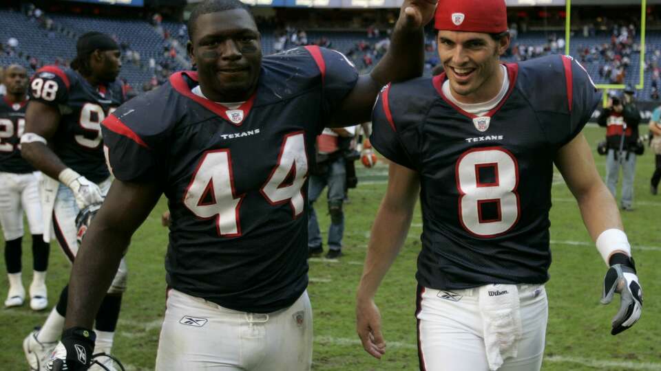 Houston Texans fullback Vonta Leach (44) and quarterback David Carr (8) walk off the field after the Texans beat the Cleveland Browns Sunday, Dec. 31, 2006, at Reliant Stadium in Houston. The Texans beat the Browns 14-6, finishing the season with a 6-10 record. (Photo by Brett Coomer / Houston Chronicle)