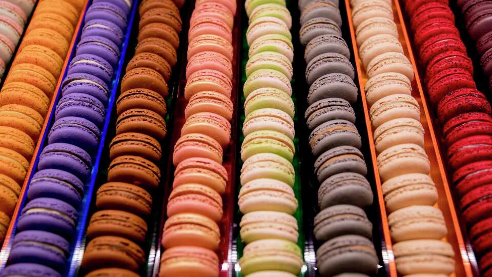 Colorful macarons line the inside of the first floor counter at One65 in San Francisco, Calif. Tuesday, May 14, 2019.