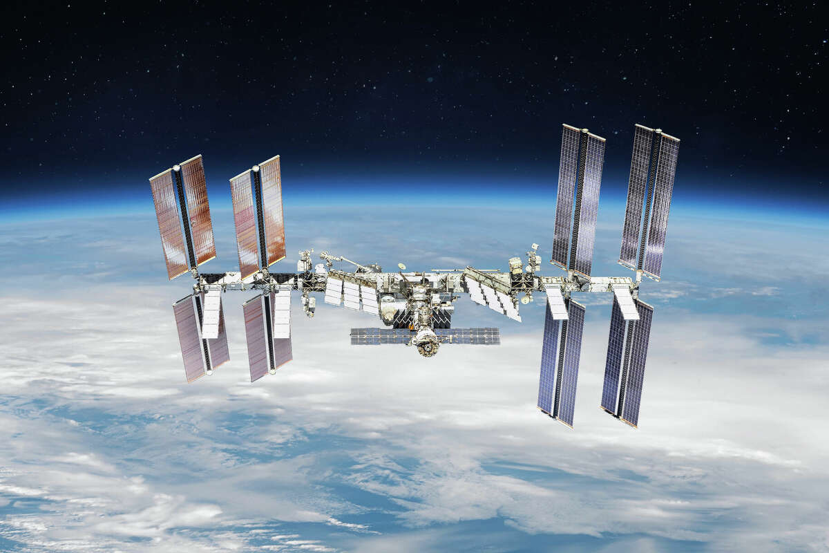 International space station on orbit of the Earth planet. View from outer space.ISS. Earth with clouds and blue sky. Elements of this image furnished by NASA (url: https://images-assets.nasa.gov/image/iss056e201225/iss056e201225~small.jpg https://www.nasa.gov/sites/default/files/styles/full_width_feature/public/thumbnails/image/iss065e333863.jpg)