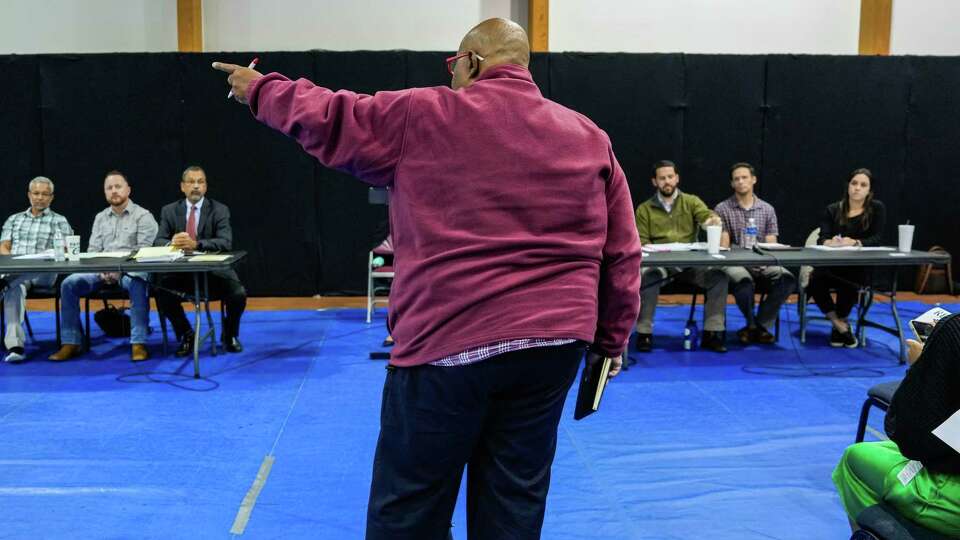 Super Neighborhood Alliance Vice Chair Keith Downey speaks at an informational meeting hosted by the Texas Commission on Environmental Quality on a proposed concrete crushing facility near Lyndon B. Johnson Hospital for community members, lawmakers and environmental justice advocates on Thursday, Dec. 7, 2023, at New Mount Calvary Missionary Baptist Church in Houston. Most community members in attendance oppose the plant, which they say could expose already vulnerable patients and residents to harmful pollutants.