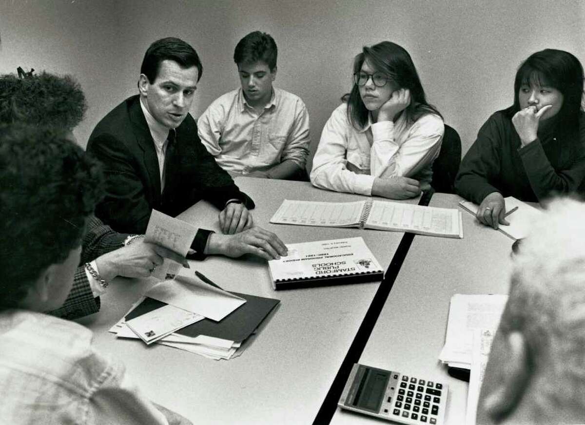 1990: Dannel Malloy, third from left, Chairman of the Board of Finance, speaking to three Stamford HS students, from left to right, Josh Fedeli, Anna Norgren, and Emily Tsai. The three students walked out of school earlier that week to protest cuts to the education budget.